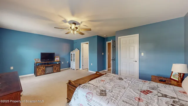 a front view of a house with a yard and a garage