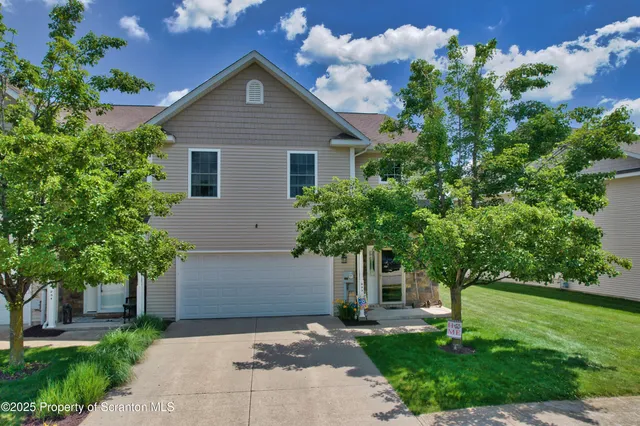 an aerial view of a golf course with a garden