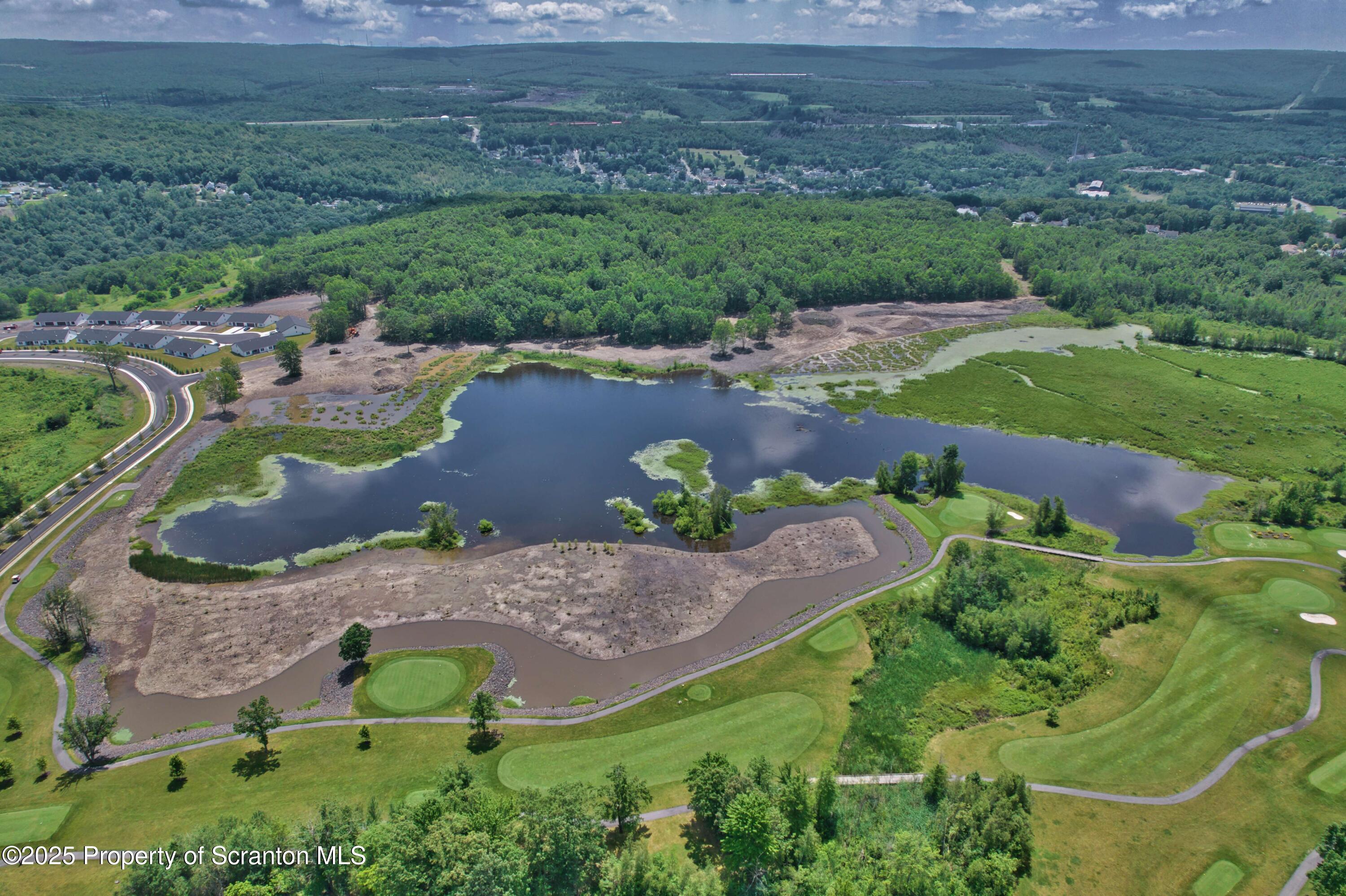 233 Shadow Wood Circle Archbald, PA 18403 - Photo 59 of 62 an aerial view of a house with yard