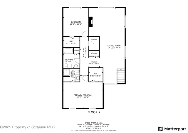 a kitchen with stainless steel appliances a refrigerator and cabinets