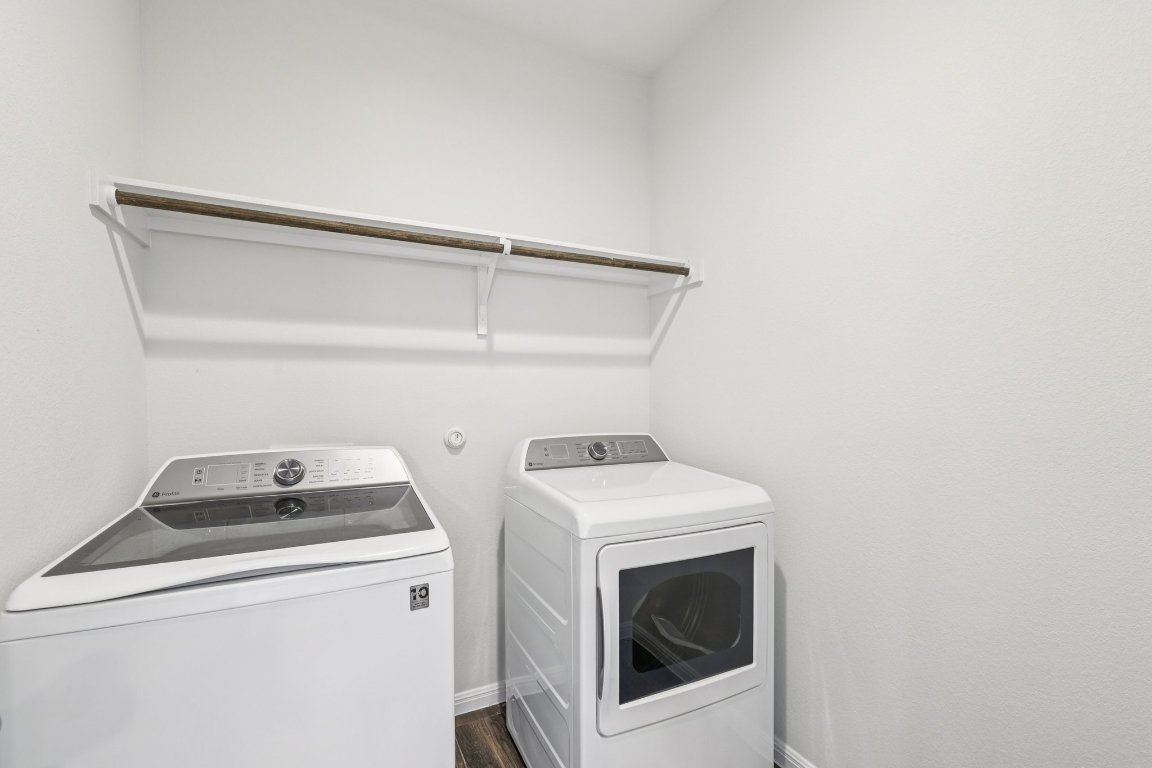 10712 Blacket Drive Austin, TX 78747 - Photo 15 of 40 a utility room with dryer and washer