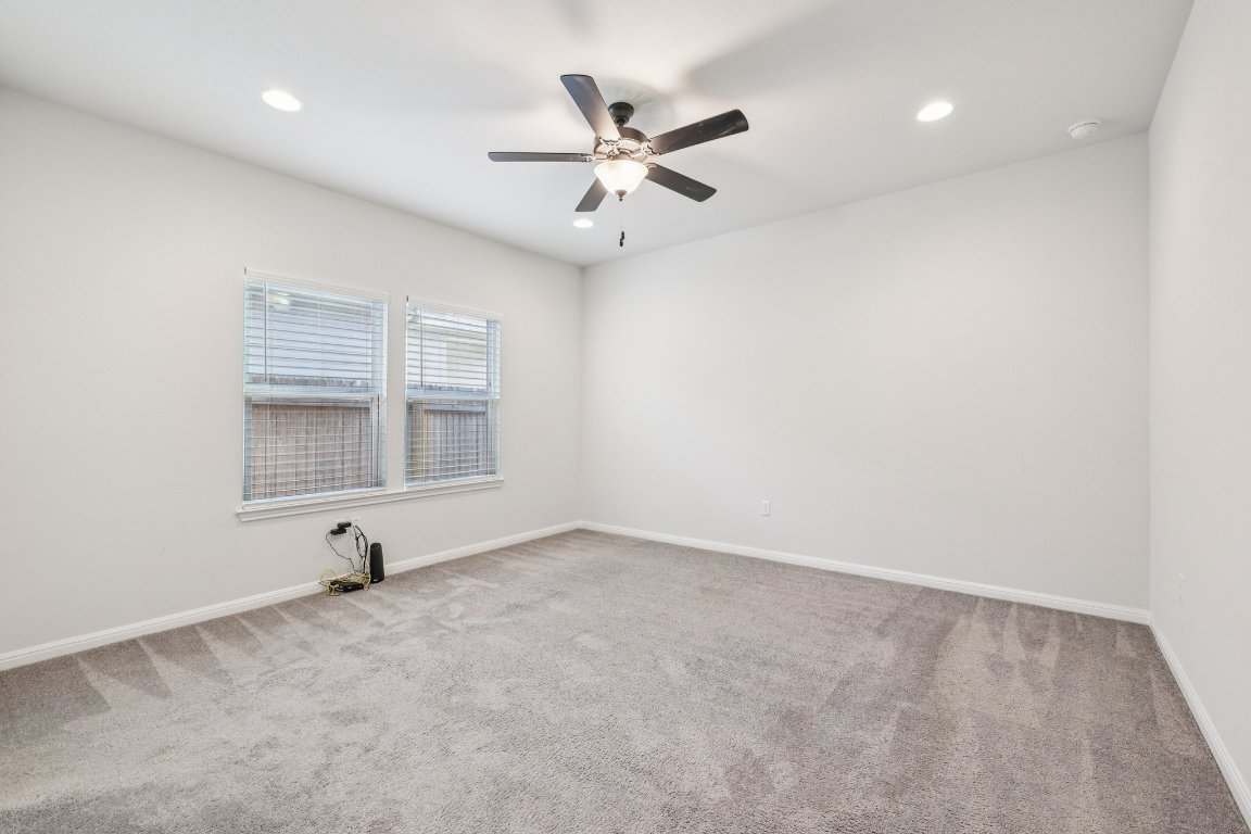10712 Blacket Drive Austin, TX 78747 - Photo 18 of 40 wooden floor in an empty room with a window