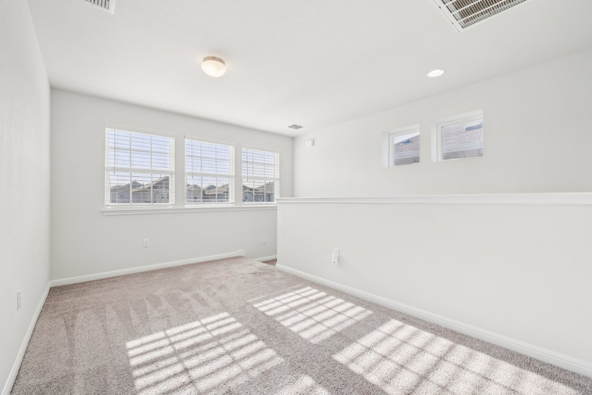 10712 Blacket Drive Austin, TX 78747 - Photo 33 of 40 a view of an empty room with a window