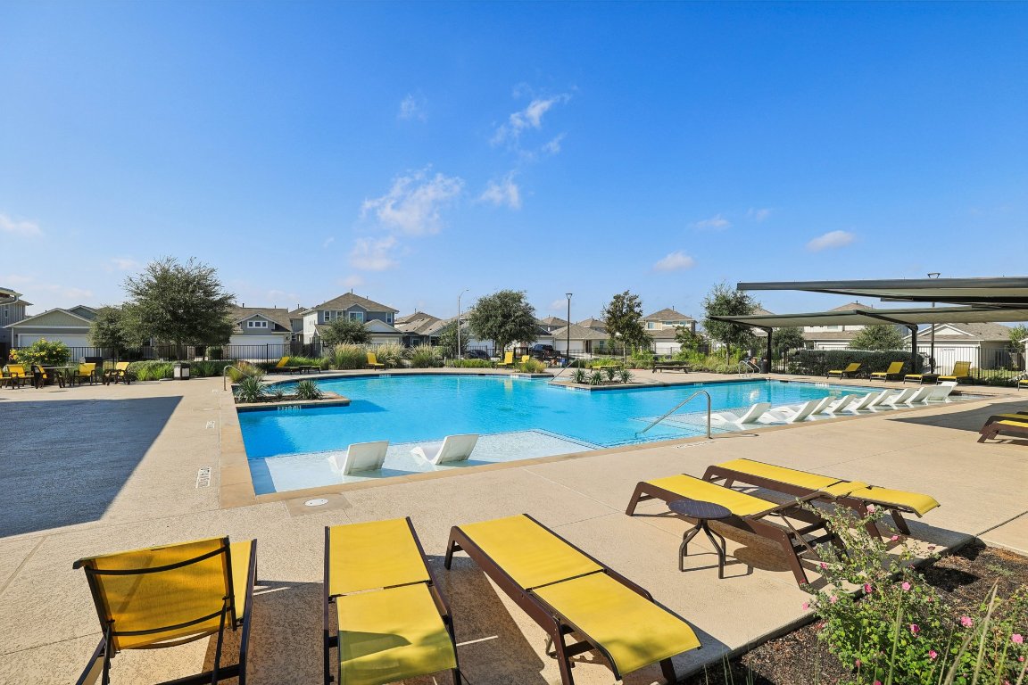 10712 Blacket Drive Austin, TX 78747 - Photo 40 of 40 a view of swimming pool with outdoor seating