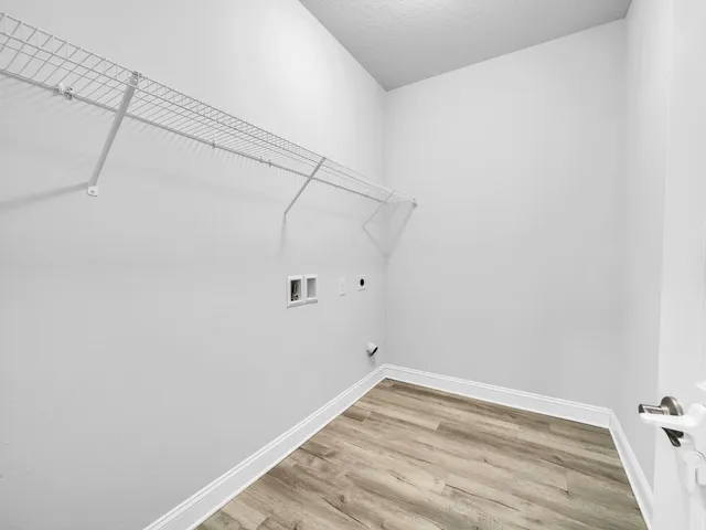 a view of a room with racks on the wall