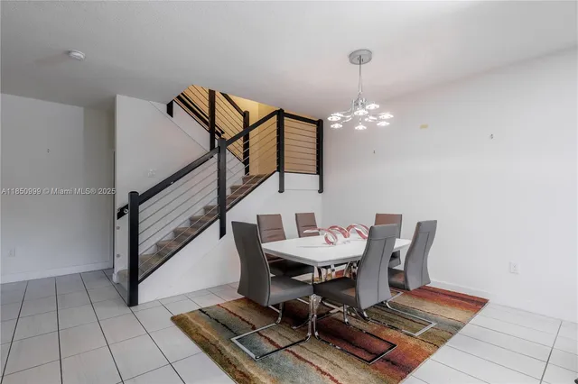 a spacious bedroom with a large bed and a couch