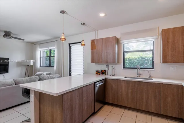 a spacious bedroom with a bed and a window