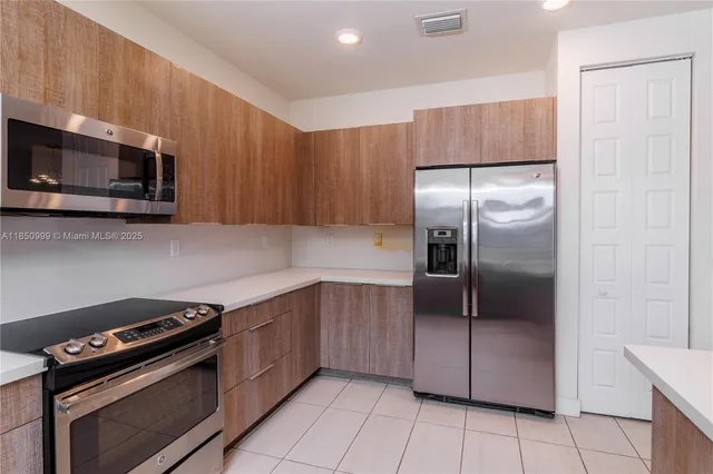 a bedroom with a bed and a cabinets