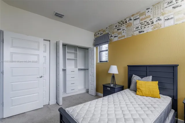 a bathroom with a tub sink shower and a mirror