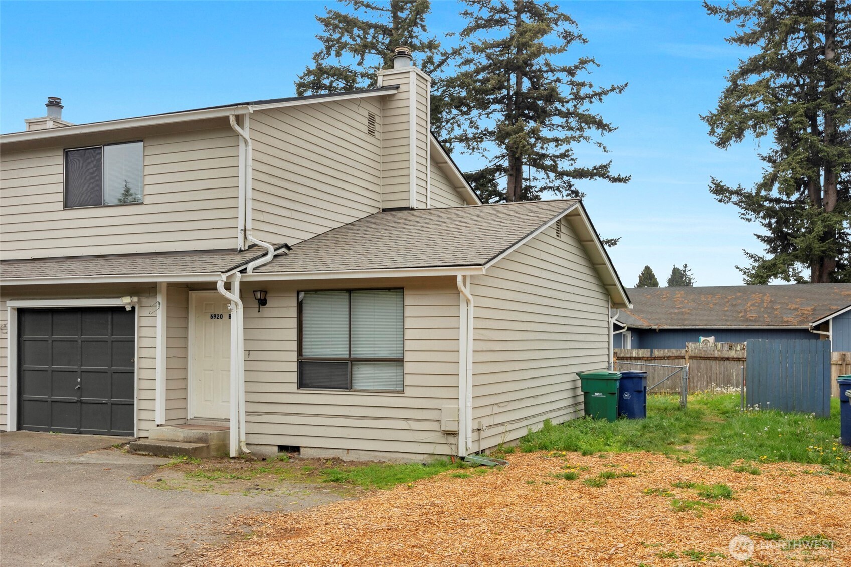 6920 Armar Road Marysville, WA 98270 - Photo 2 of 24 a view of a house with a yard