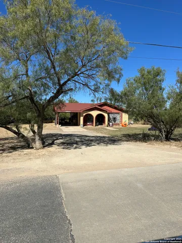 a house view with a outdoor space
