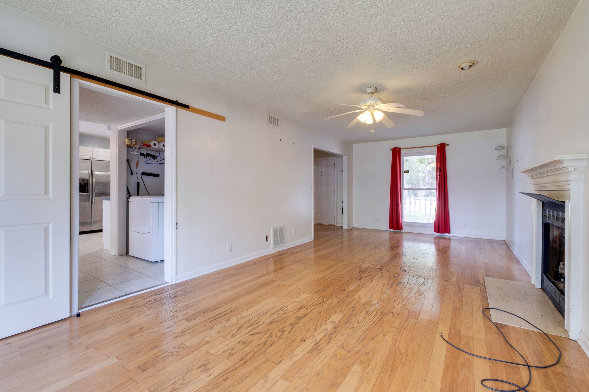 2445 Nonaville Road Mount Juliet, TN 37122 - Photo 12 of 29 a view of empty room with wooden floor and fan