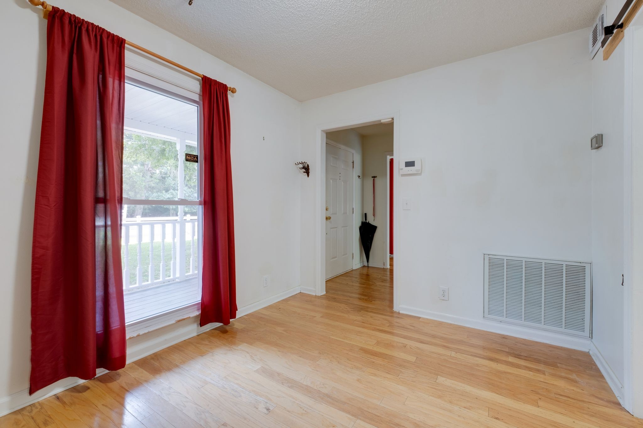 2445 Nonaville Road Mount Juliet, TN 37122 - Photo 13 of 29 a view of a livingroom with wooden floor and front door