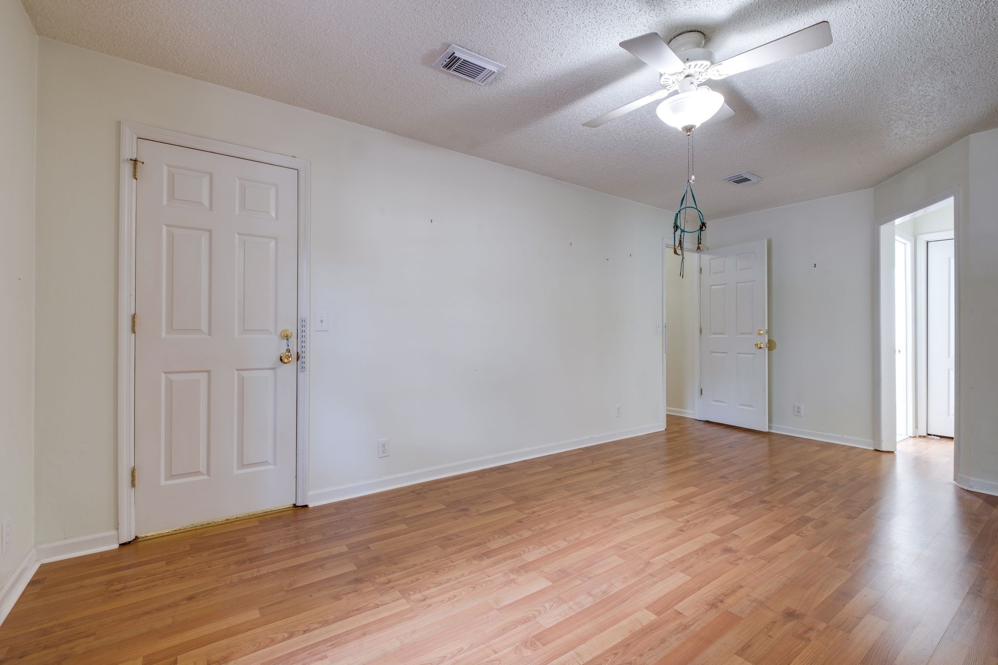 2445 Nonaville Road Mount Juliet, TN 37122 - Photo 20 of 29 a view of an empty room with a chandelier fan