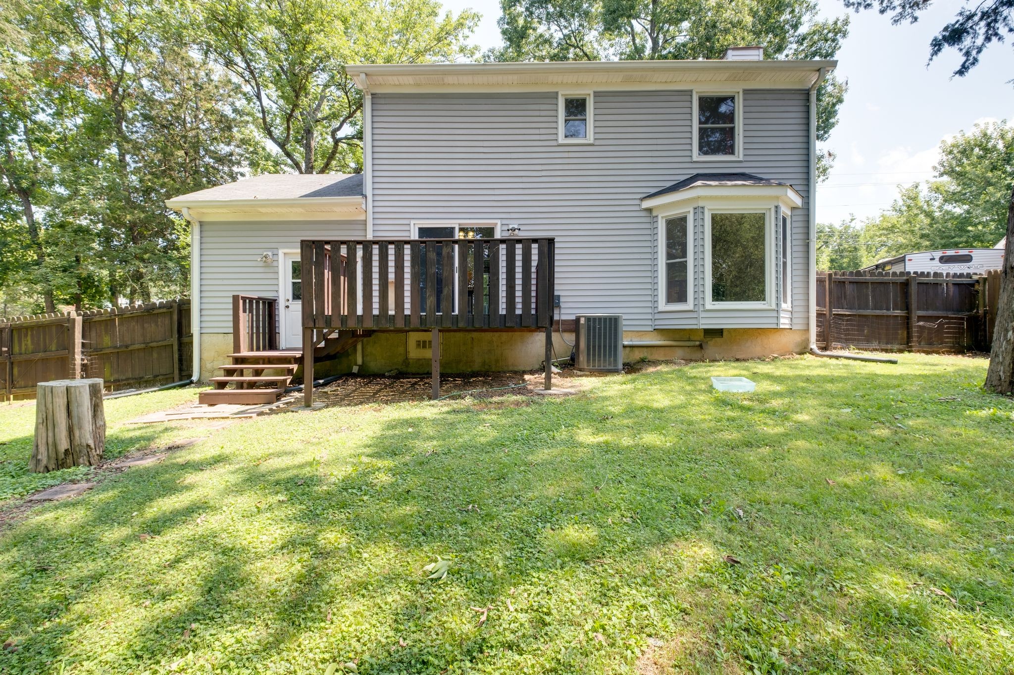 2445 Nonaville Road Mount Juliet, TN 37122 - Photo 28 of 29 a view of a house with a yard and a large tree