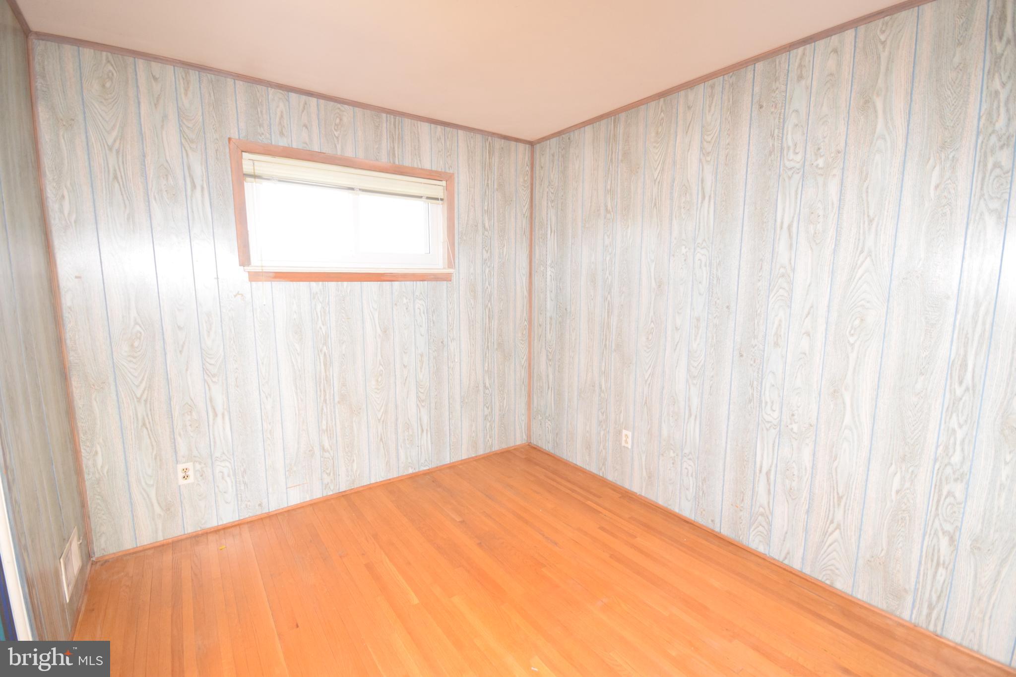 7004 Redmiles Road Laurel, MD 20707 - Photo 20 of 35 Bedroom 2 with hardwood floors