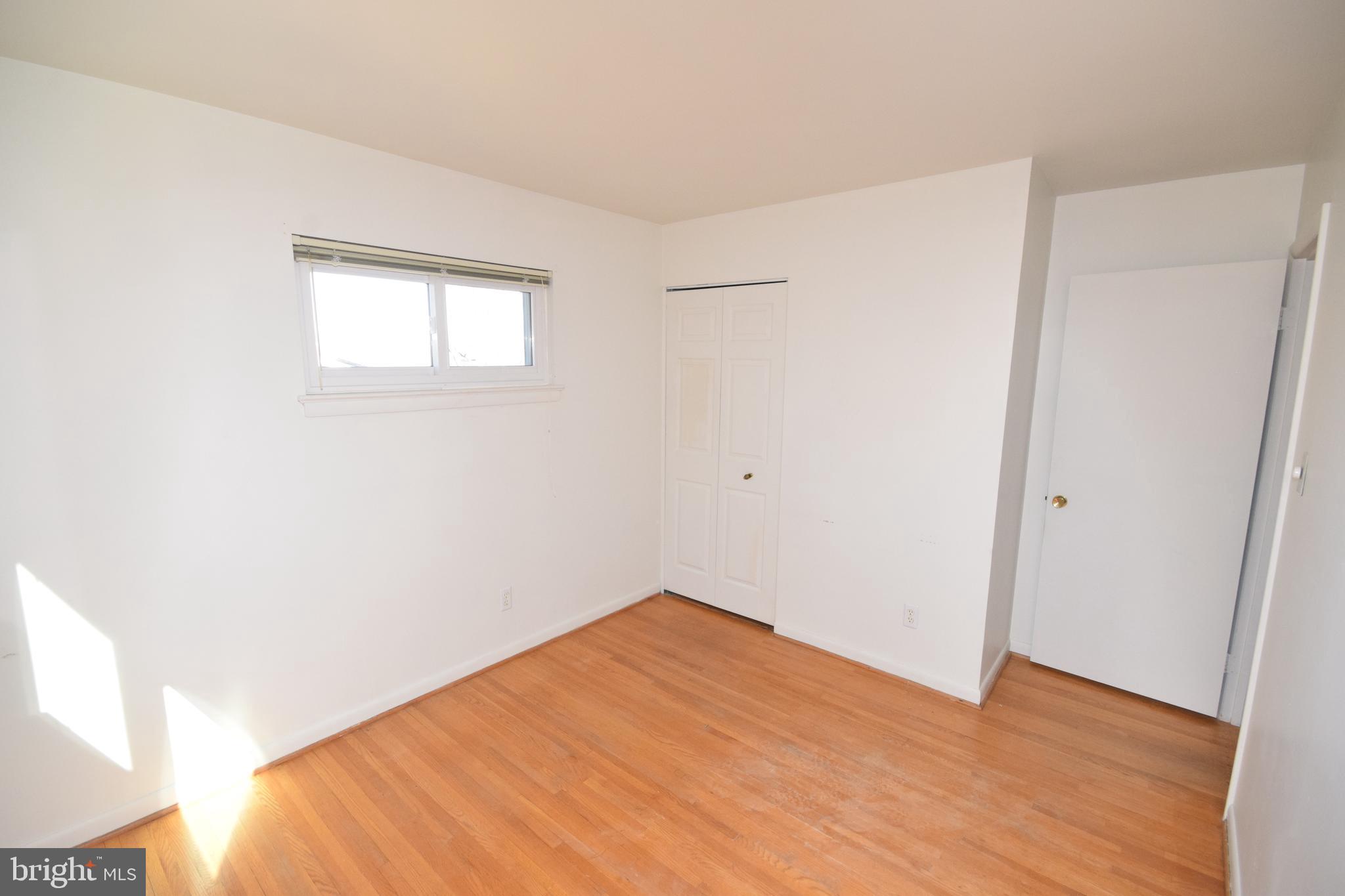 7004 Redmiles Road Laurel, MD 20707 - Photo 22 of 35 Bedroom 4 with hardwood floors