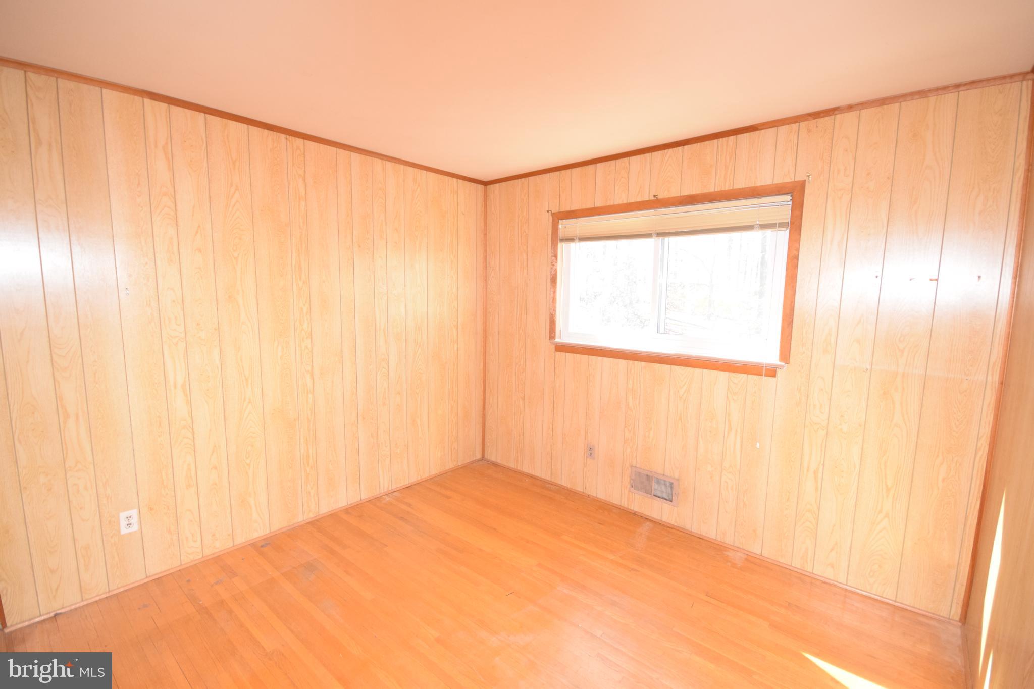 7004 Redmiles Road Laurel, MD 20707 - Photo 23 of 35 Bedroom 3 with hardwood floors