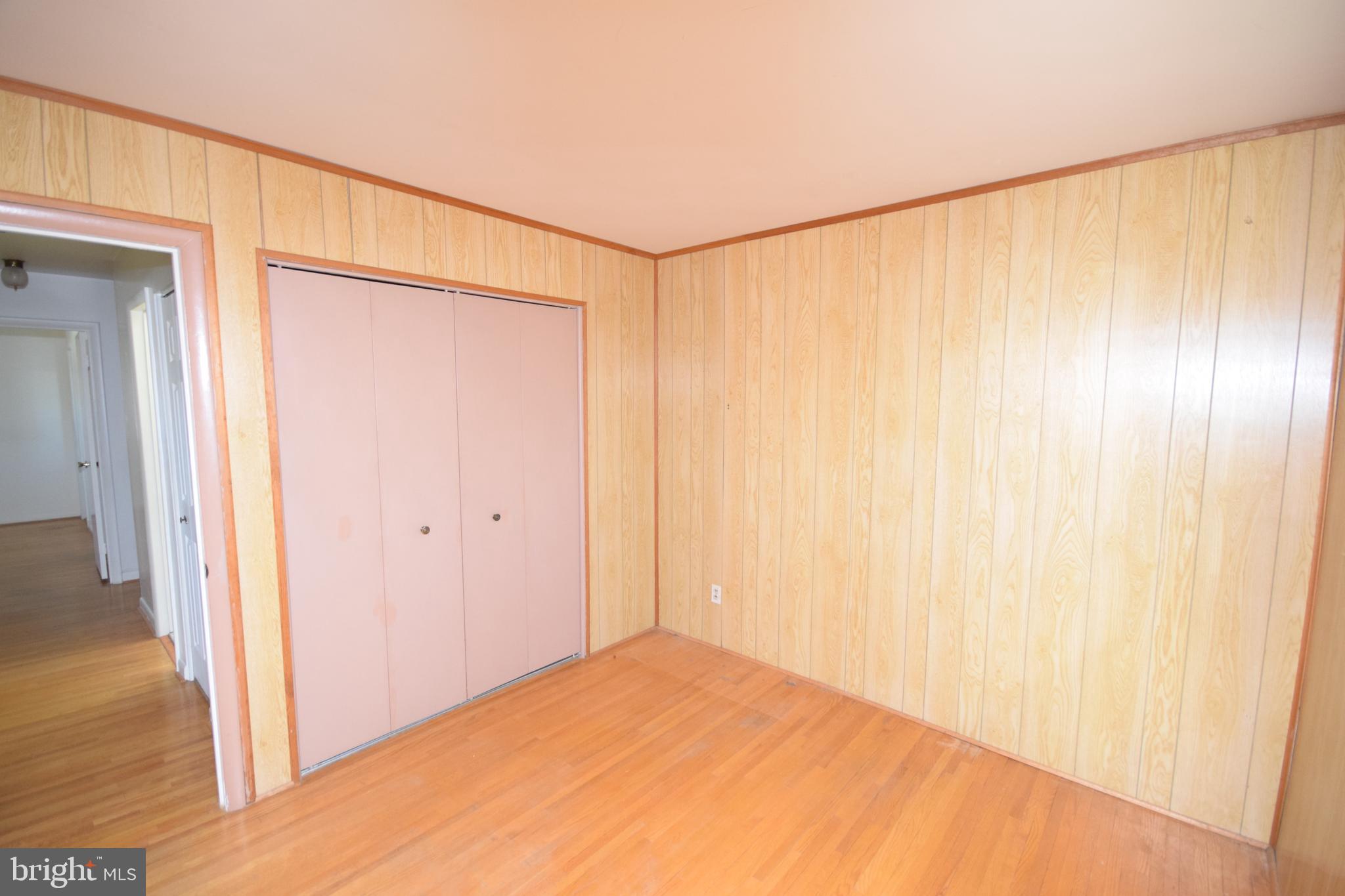 7004 Redmiles Road Laurel, MD 20707 - Photo 24 of 35 Bedroom 3 with hardwood floors