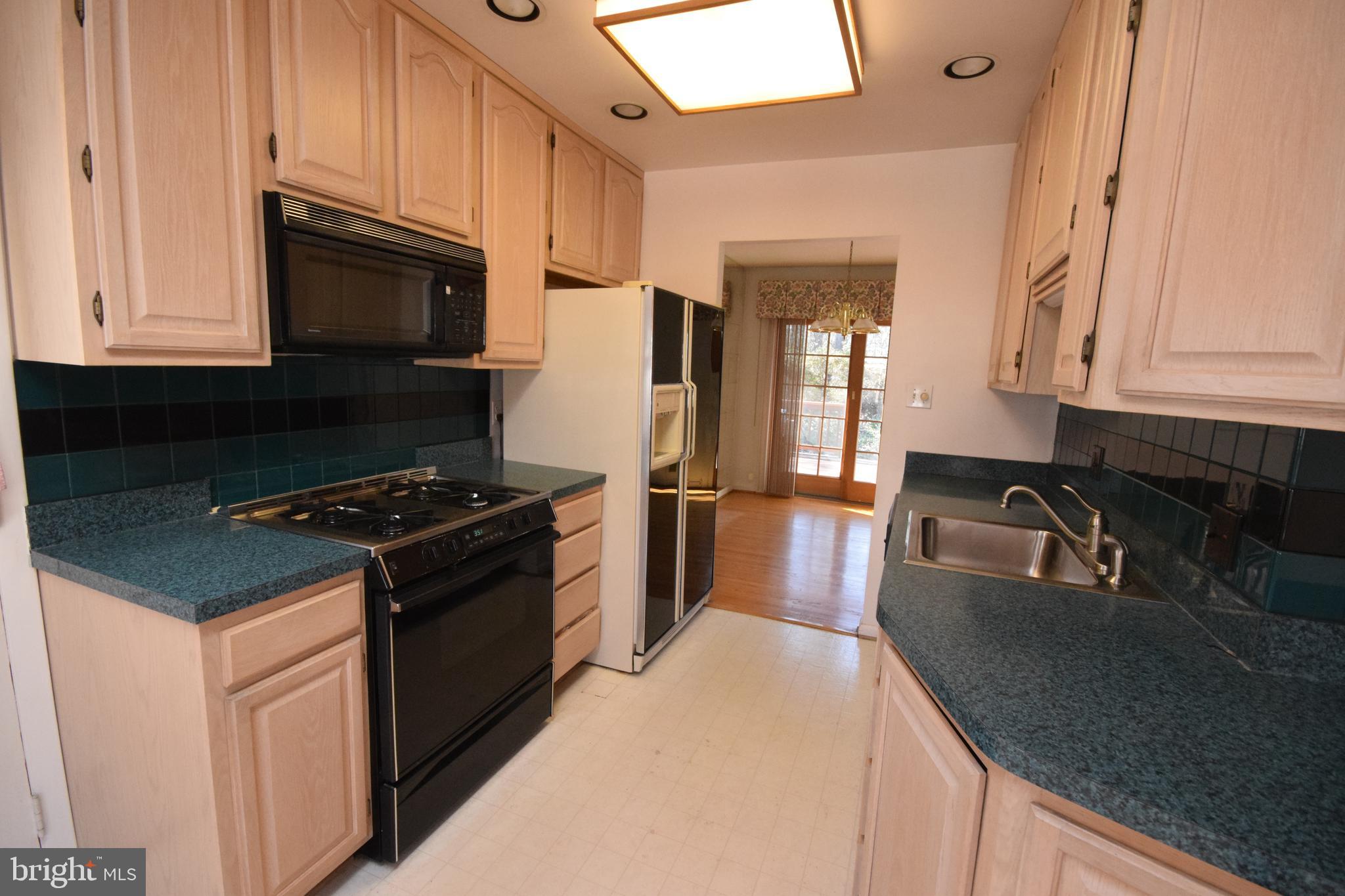 7004 Redmiles Road Laurel, MD 20707 - Photo 7 of 35 Remodeled kitchen w/bay window, gas cooking