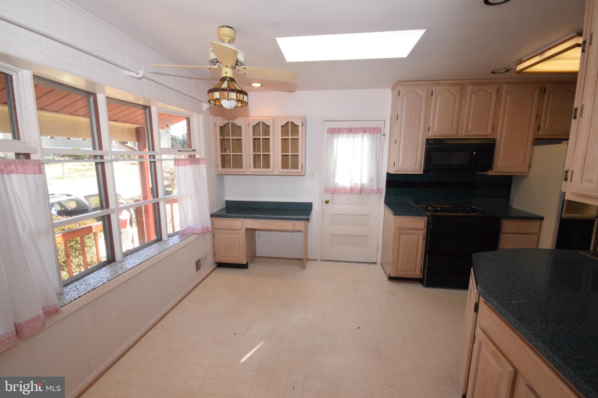 7004 Redmiles Road Laurel, MD 20707 - Photo 9 of 35 Remodeled kitchen w/bay window, gas cooking