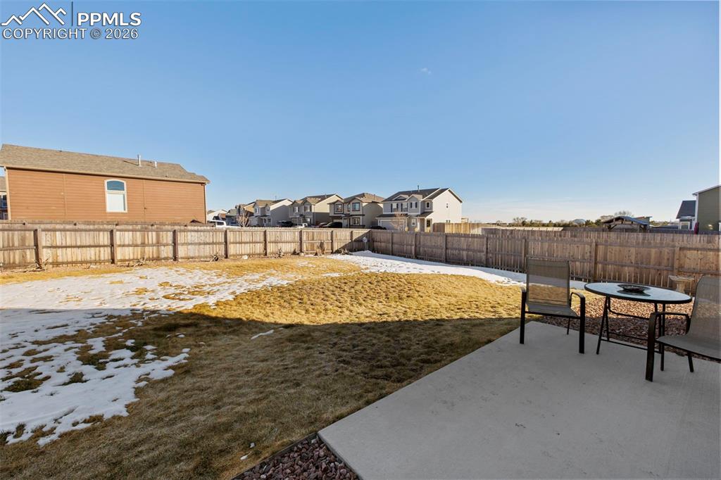 8151 Berwyn Loop Peyton, CO 80831 - Photo 32 of 39 a view of a swimming pool with an outdoor seating