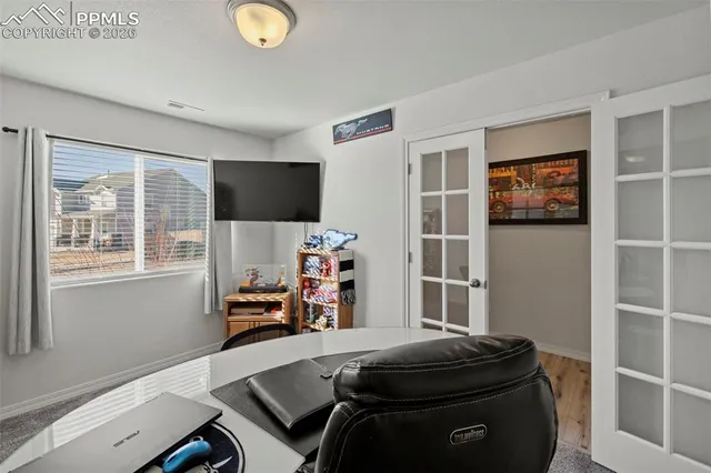 a room with furniture and a window