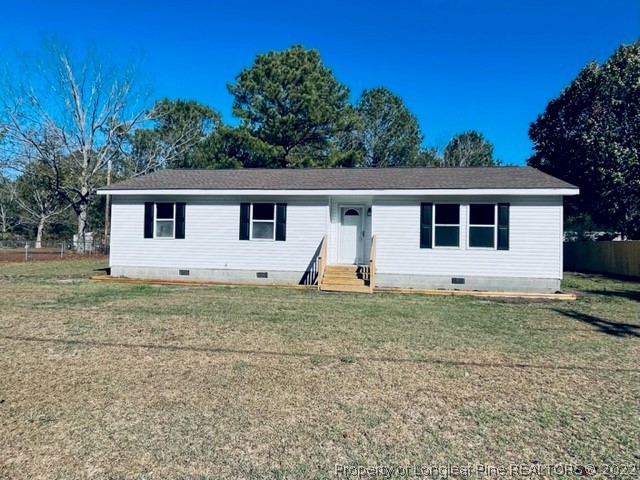 5881 Murphy Road Stedman, NC 28391 - Photo 1 of 22 a view of a house with backyard