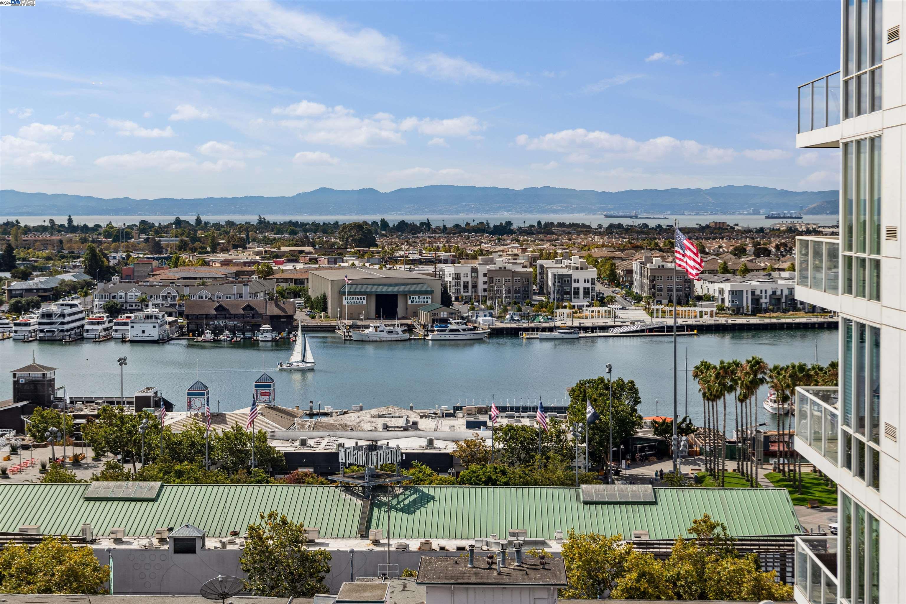 222 Broadway, Unit 1106 Oakland, CA 94607 - Photo 15 of 22 an aerial view of a city and lake view