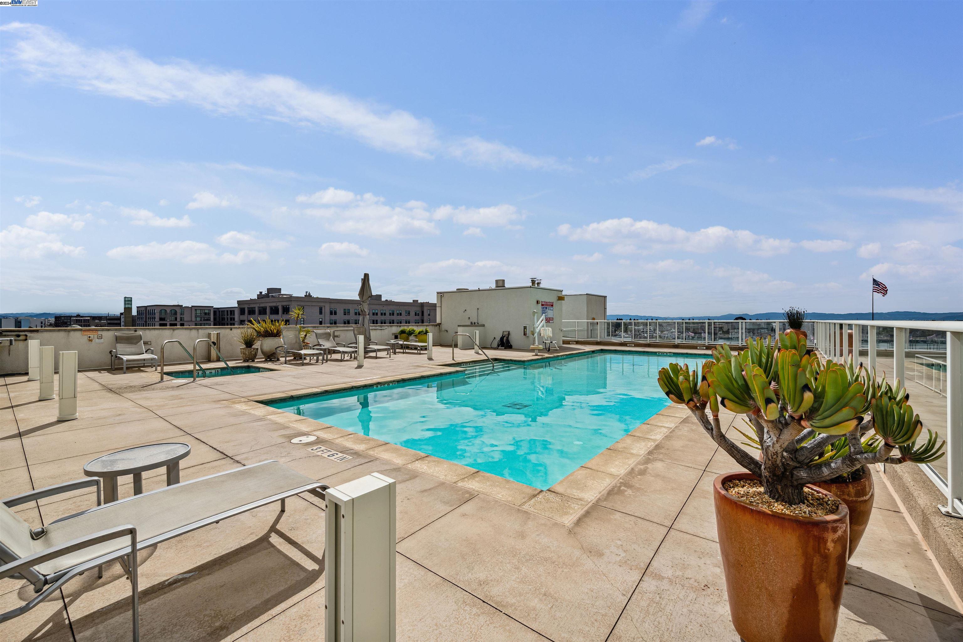 222 Broadway, Unit 1106 Oakland, CA 94607 - Photo 18 of 22 a view of a terrace with a garden