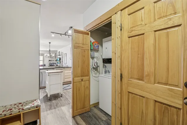 a bathroom with a shower and a sink