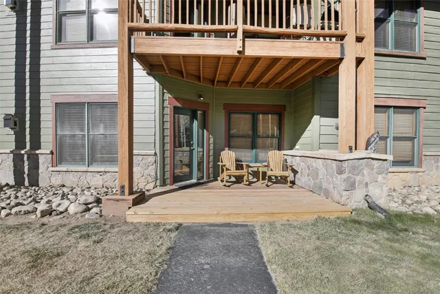 a view of a dinning table and chairs in the patio