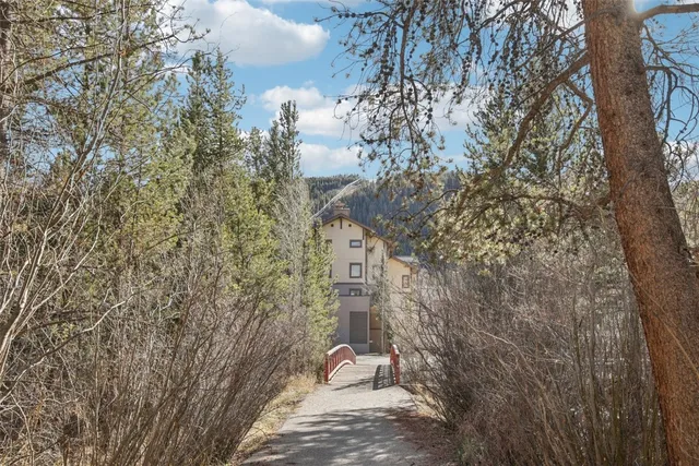 a view of a pathway with a building in the background