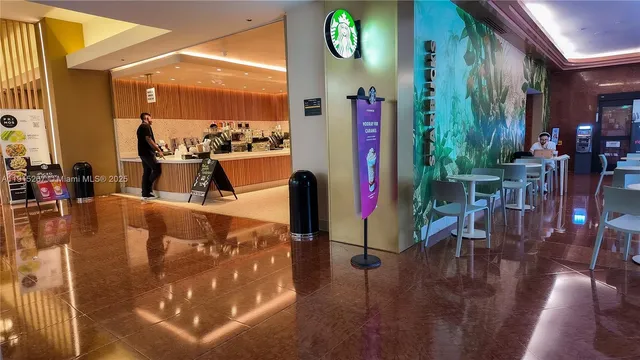 a view of swimming pool with outdoor seating