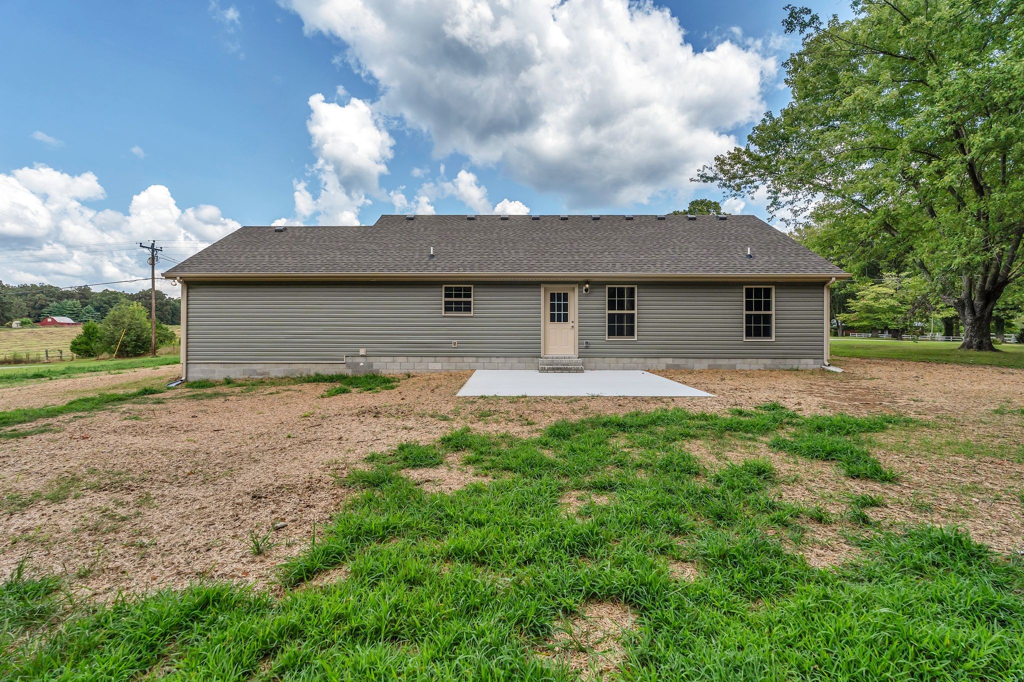 393 Flowertown Road Normandy, TN 37360 - Photo 33 of 34 a front view of house with yard and trees around