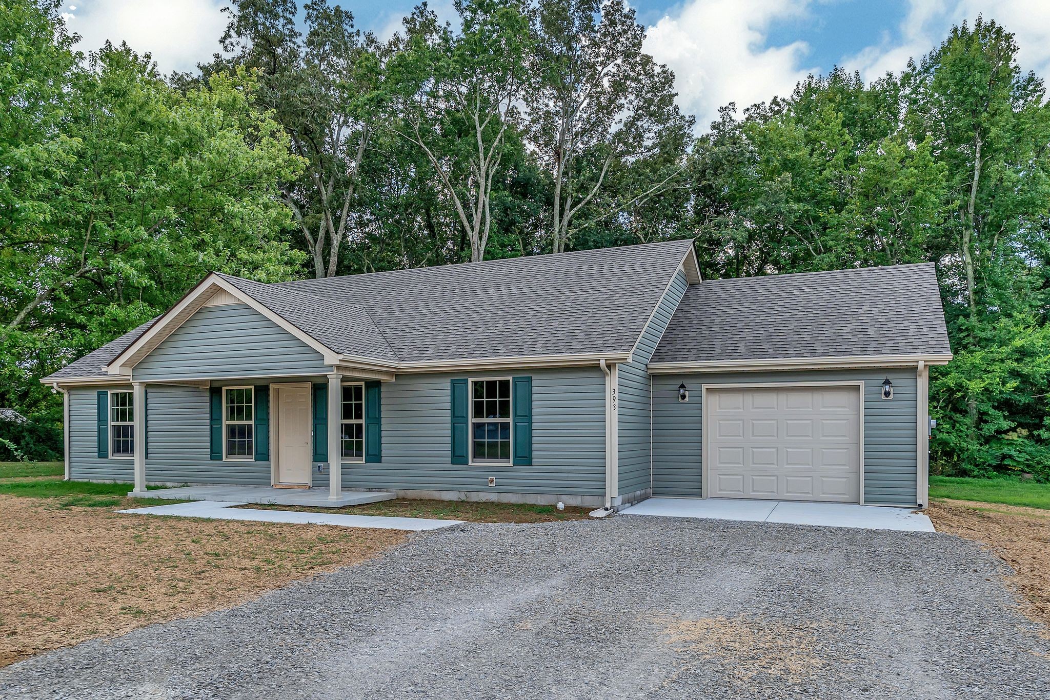 393 Flowertown Road Normandy, TN 37360 - Photo 4 of 34 front view of a house and a yard