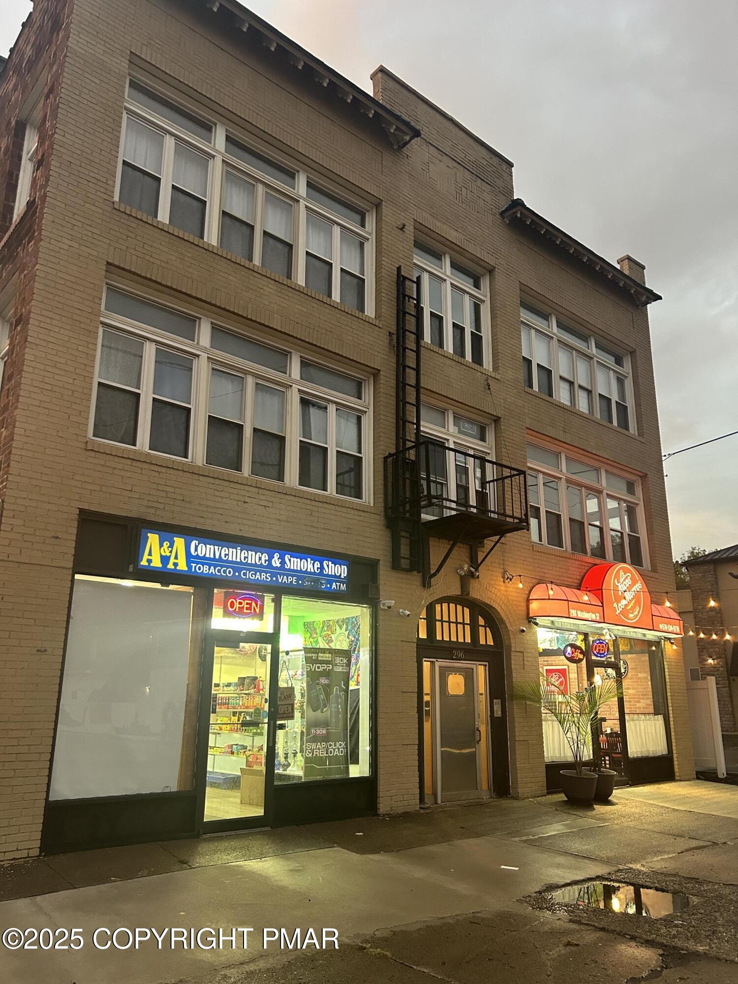 296 Washington Street, Unit 3B East Stroudsburg, PA 18301 - Photo 1 of 5 a front view of a building