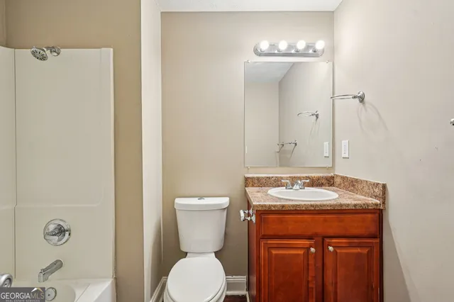 a bathroom with a sink and a toilet