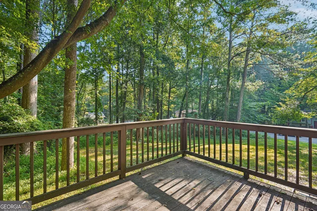 a view of a park with large trees
