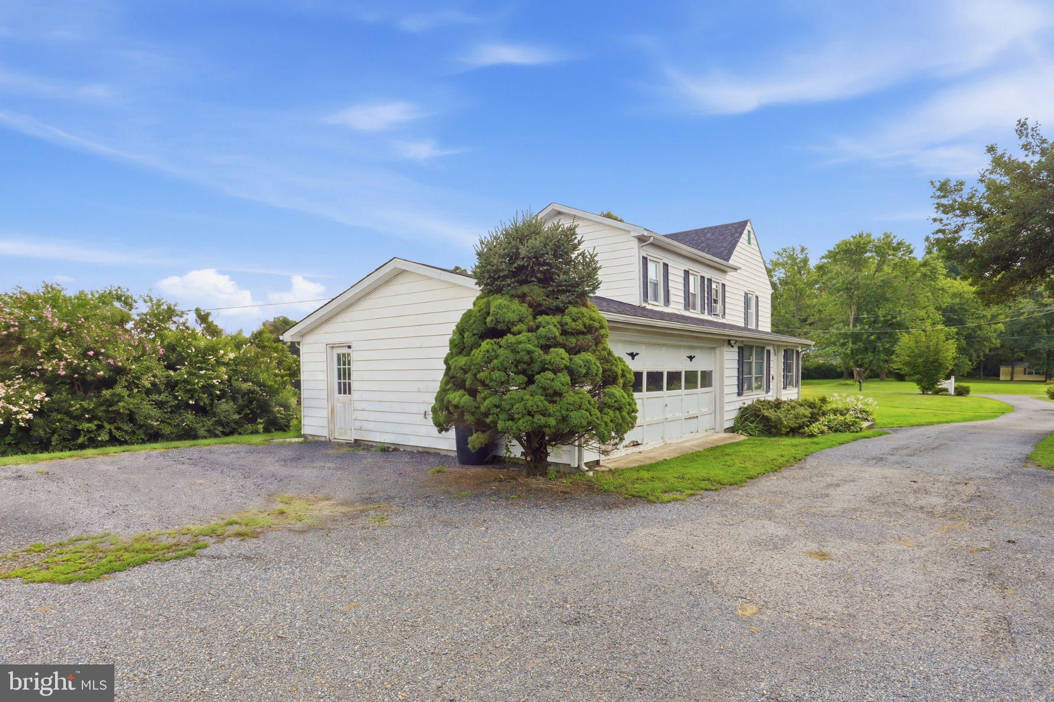 2547 Chance Road Clayton, DE 19938 - Photo 8 of 50 Charming home with lush greenery.