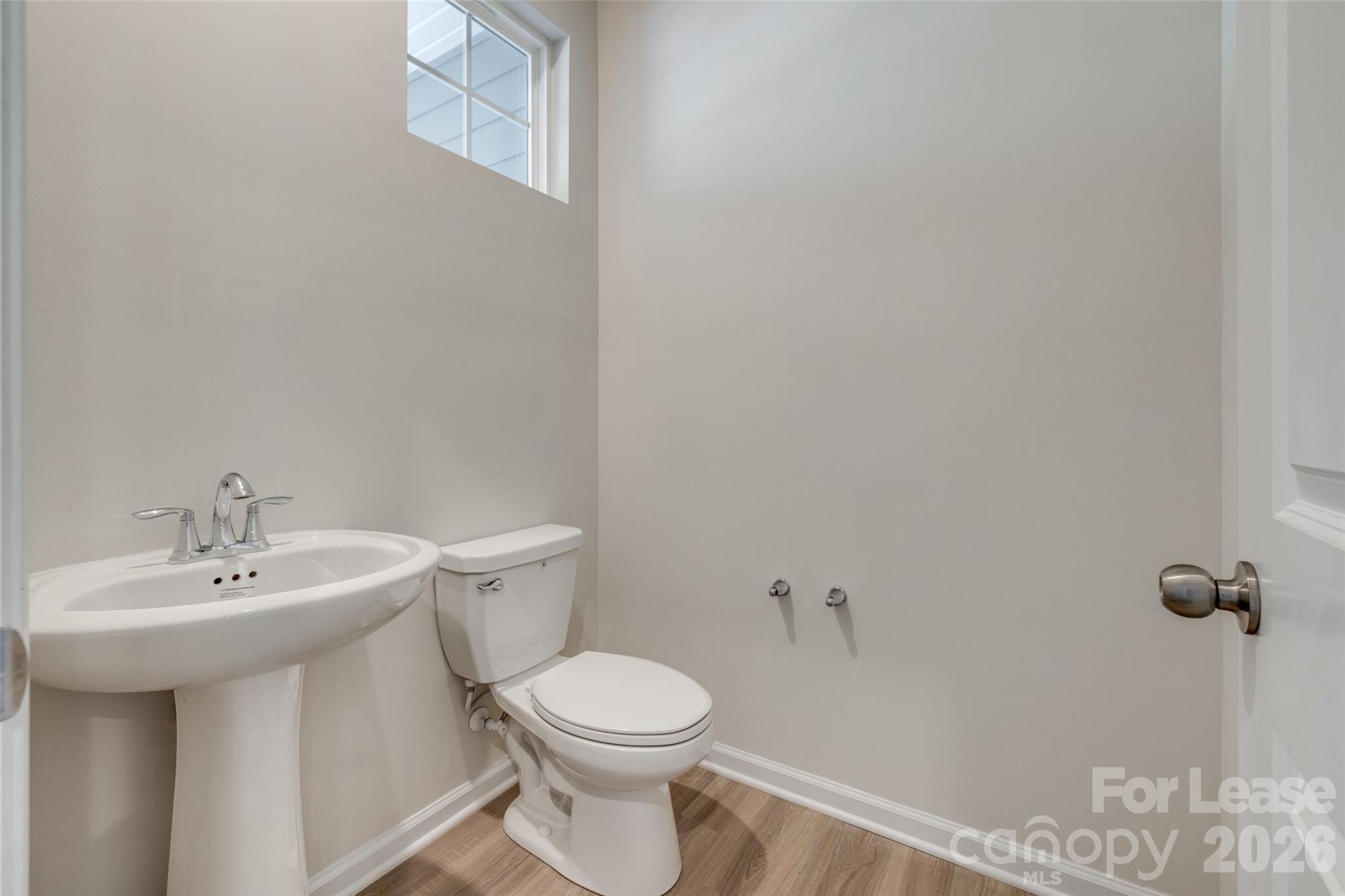 807 Gable Oak Lane Fort Mill, SC 29708 - Photo 15 of 39 a bathroom with a sink a toilet and mirror