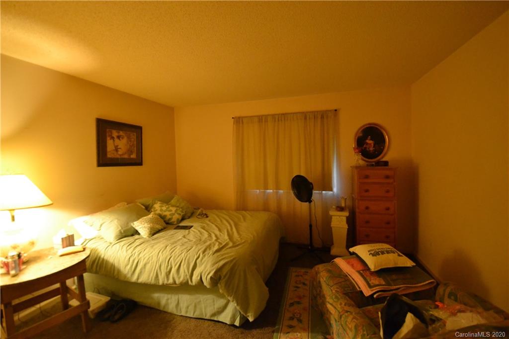 2343 Roland Drive, Unit C Monroe, NC 28110 - Photo 10 of 15 a bedroom with a bed and a window
