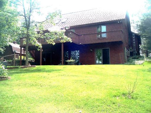3246 S Lake Reedsburg, WI 53959 - Photo 1 of 1 a house view with a swimming pool