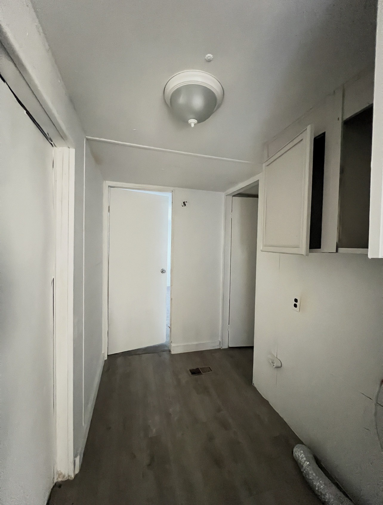 1511-1 Jones Street, Unit 1 Rosenberg, TX 77471 - Photo 7 of 13 a view of a livingroom with wooden floor and a window