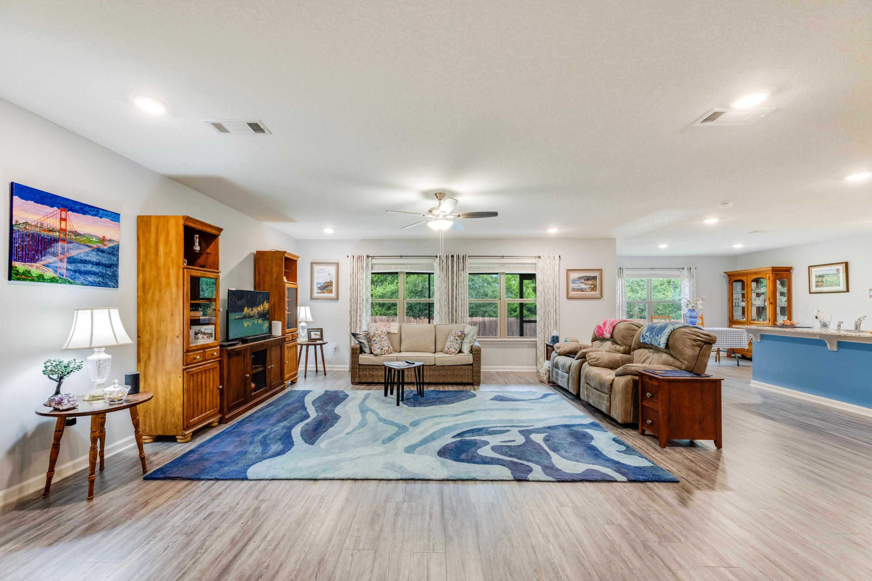 340 Merlin Court Crestview, FL 32539 - Photo 2 of 63 a living room with furniture and wooden floor
