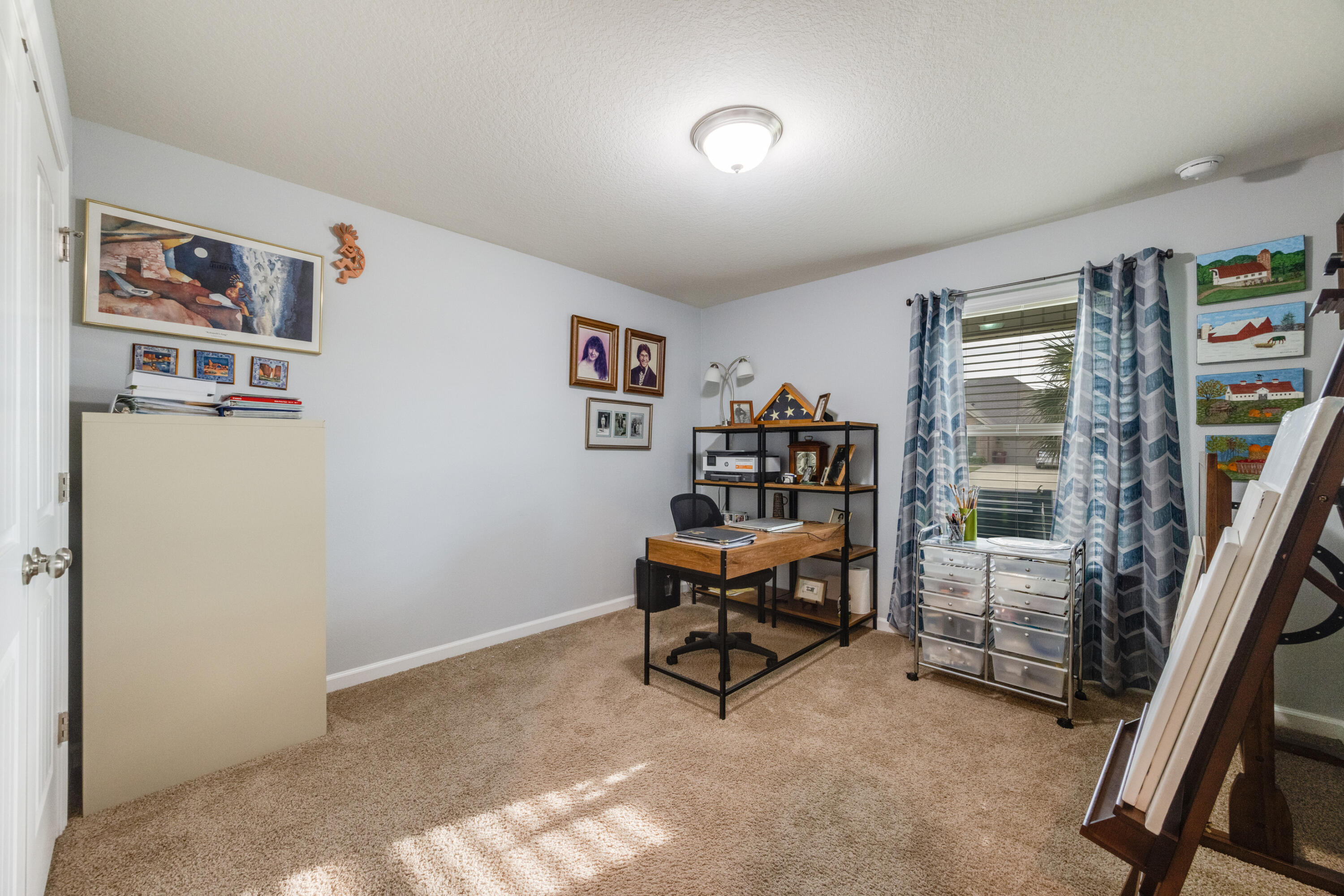 340 Merlin Court Crestview, FL 32539 - Photo 35 of 63 a living room with furniture and a window