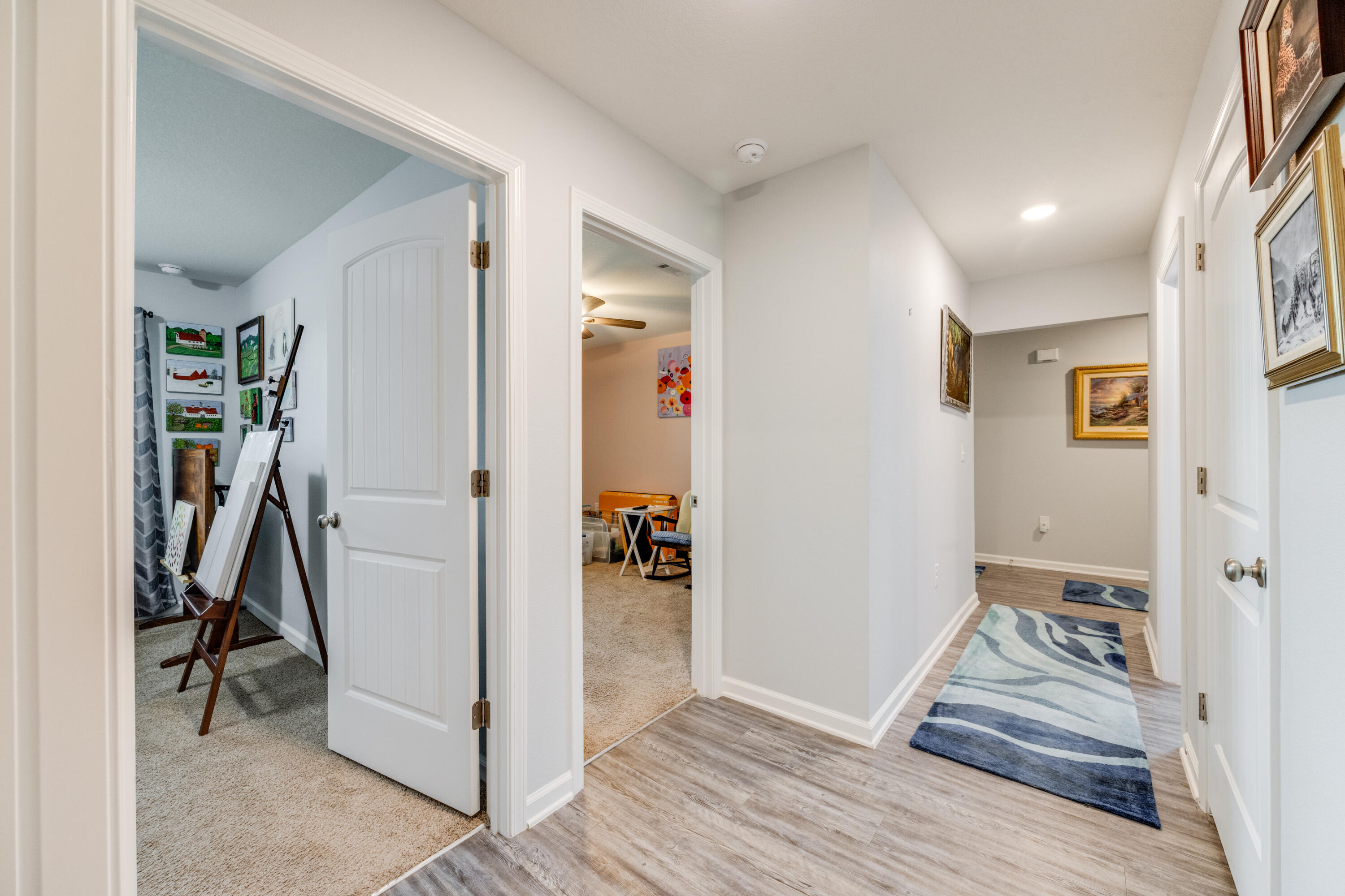 340 Merlin Court Crestview, FL 32539 - Photo 39 of 63 a view of a hallway with closet and a livingroom view
