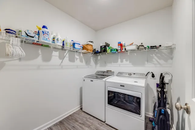 a view of a house with swimming pool and a yard
