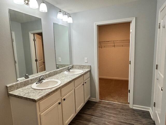340 Merlin Court Crestview, FL 32539 - Photo 59 of 63 a bathroom with a granite countertop sink and a mirror