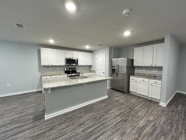 340 Merlin Court Crestview, FL 32539 - Photo 62 of 63 a kitchen with stainless steel appliances a refrigerator sink and microwave
